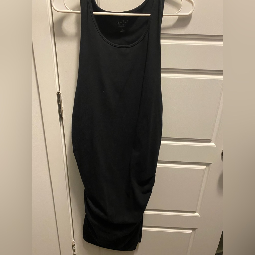 Tight fitting maternity dress. Very flattering.